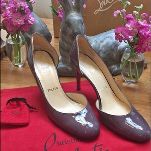 Christian Louboutin purple patent pumps